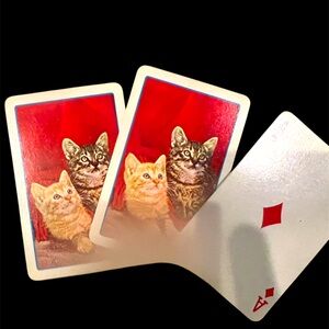 Vintage deck of playing cards with kitties
